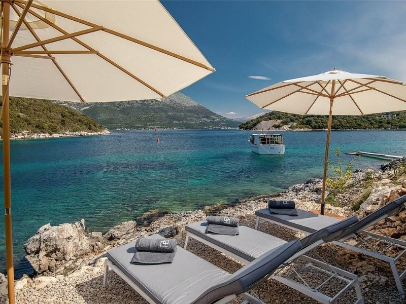 Sun loungers on beach, Korcula