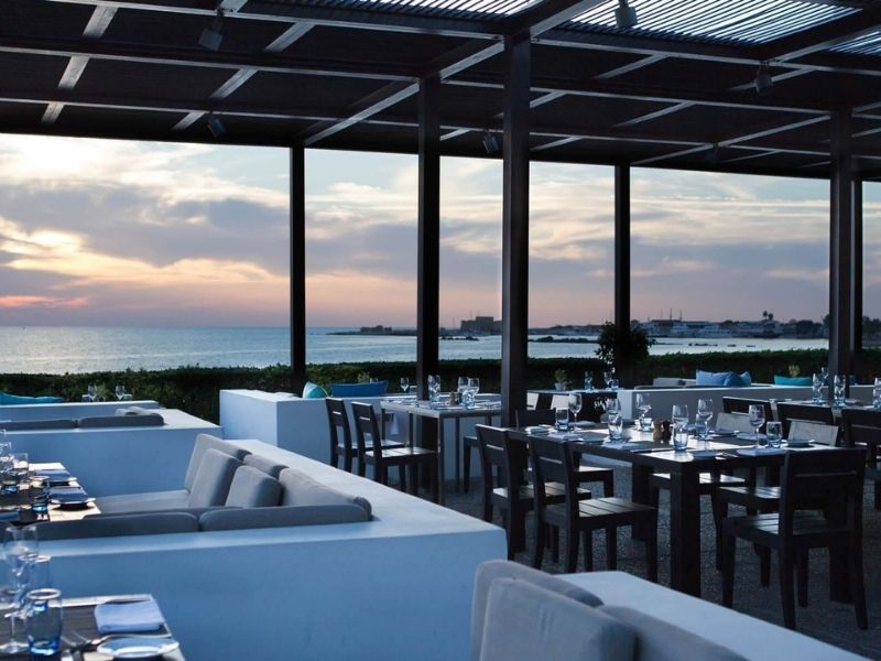 Open-air terrace at Almyra Hotel, Paphos