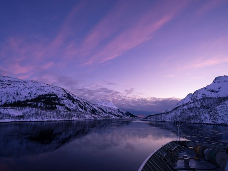 Observe breathtaking fjords aboard a sightseeing boat