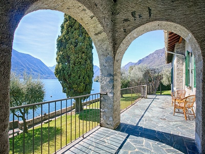 Dine al fresco on the panoramic loggia of your villa