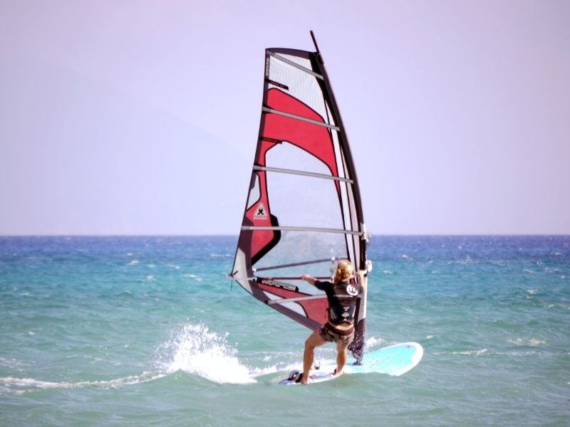 Go windsurfing during your luxury family holiday to Mauritius