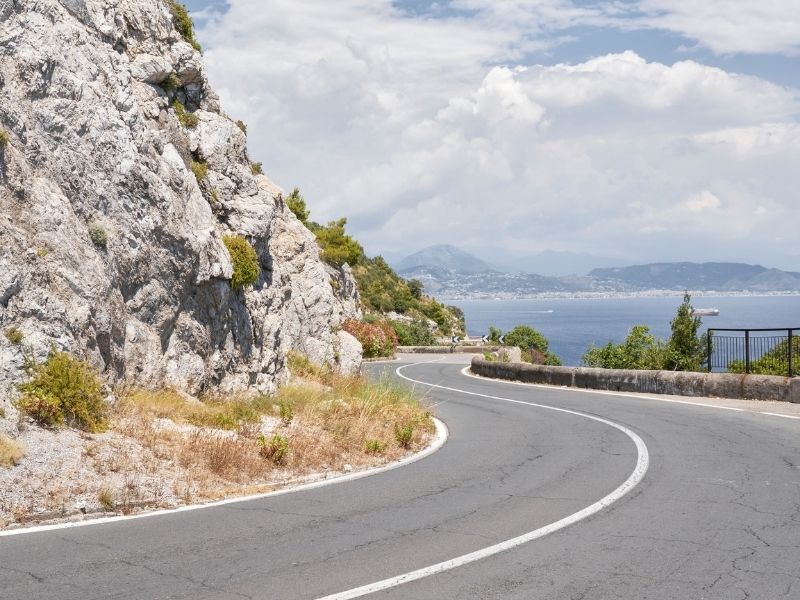 Drive along the iconic roads of the Amalfi Coast