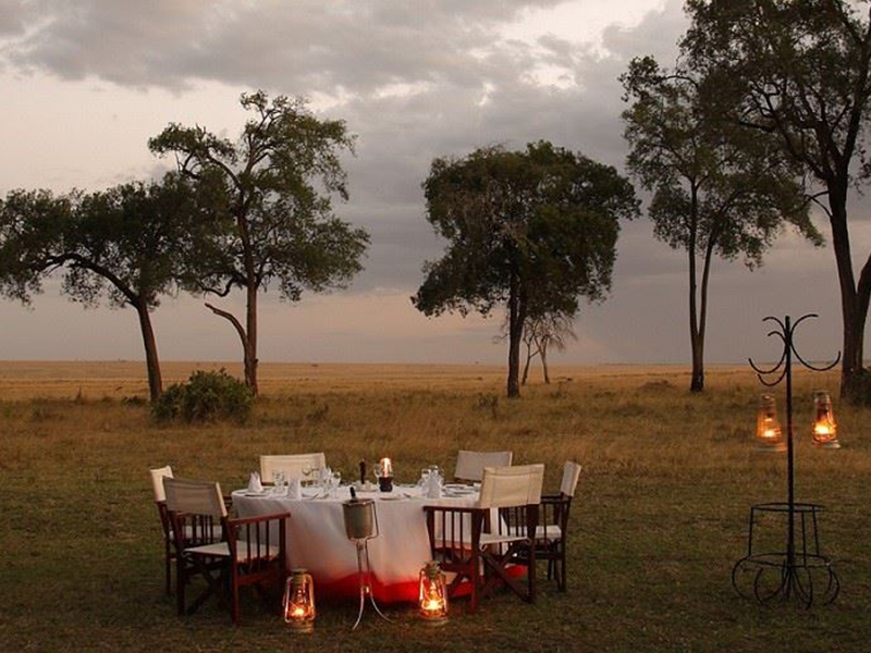 Enjoy romantic sundowners during your luxury holiday to Kenya