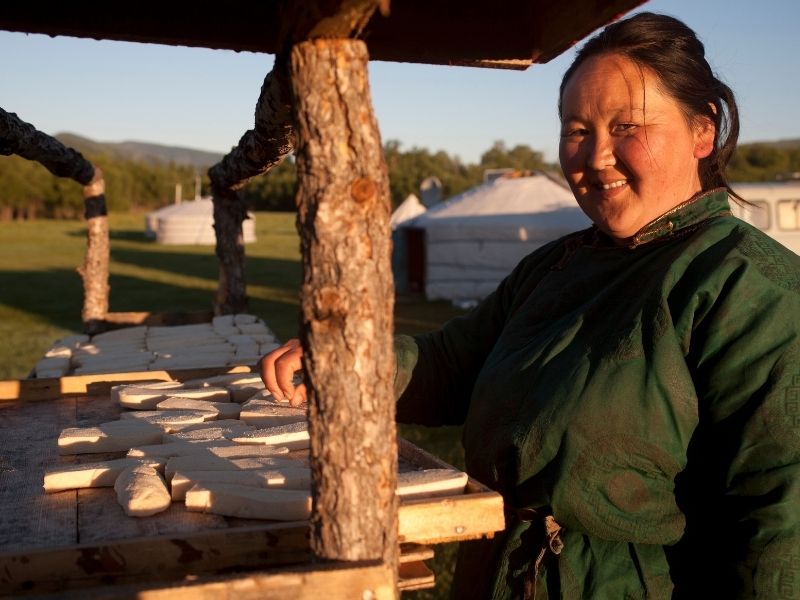 Local woman cooking, Mongolia