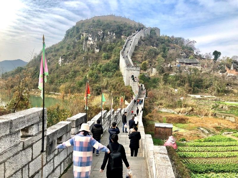 Tourists walking in Giuyang, China