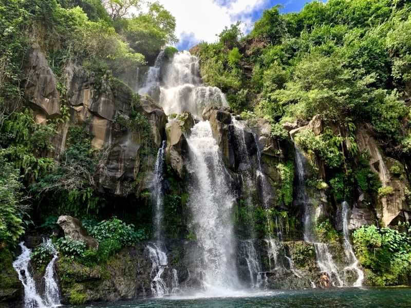 Admire the cascading waterfalls in Analamazaotra National Park during your luxury Madagascan holiday